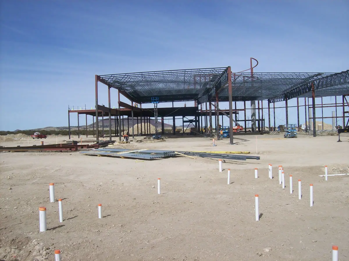 Construction site with steel framework structure.
