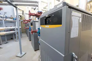 Industrial boilers with pipes and valves.